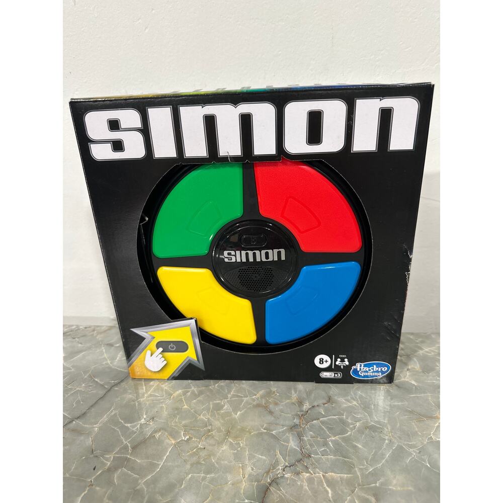 Hasbro Gaming Simon Handheld Electronic Memory Game With Lights and Sounds